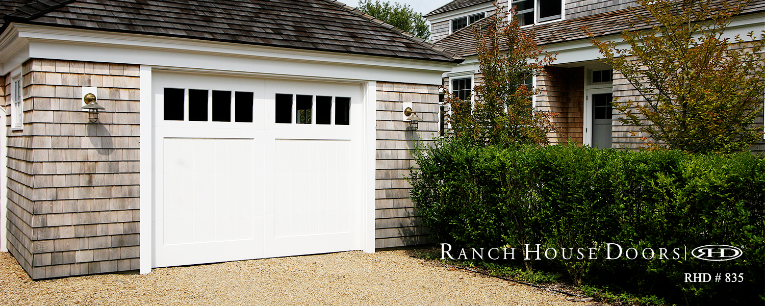 This is an image of a white steel cape craft garage door.