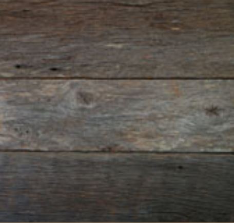 This is an image of garage door wood grain composed of barn siding or mixed oak wood.