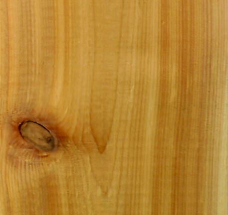 This is an image of garage door wood grain composed of cedar select tight knot wood.