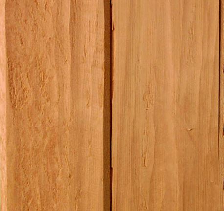 This is an image of garage door wood grain that has been hand hewn.