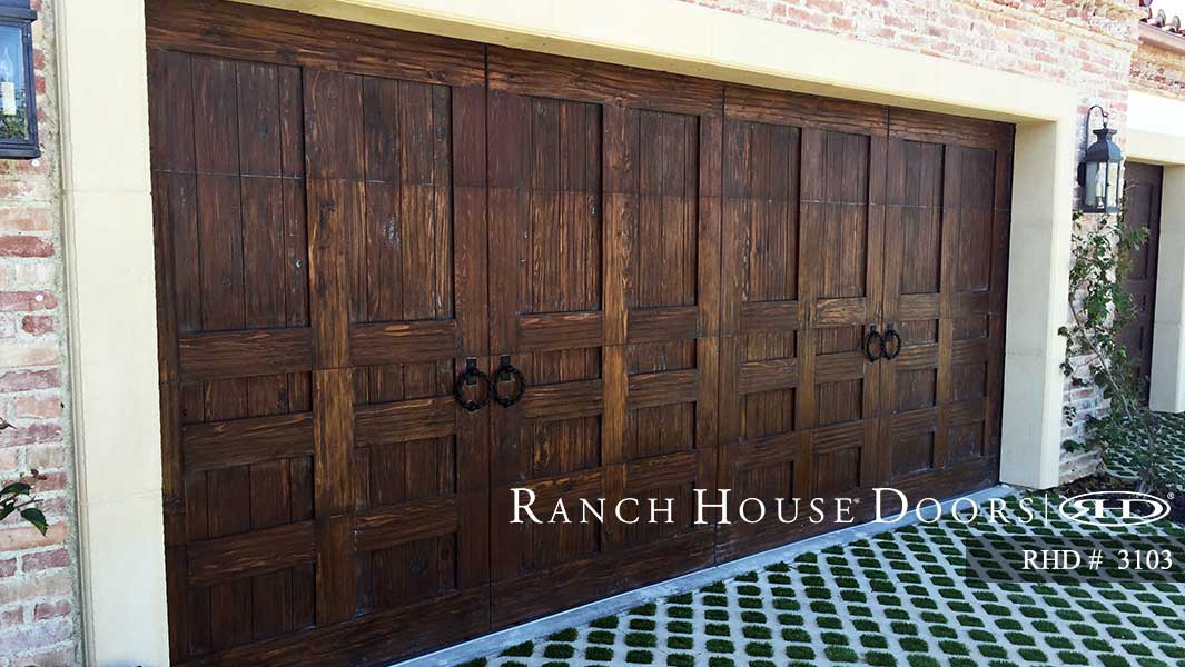 This is an image of a dark oak Spanish style wood garage door in Laguna Niguel, CA.
