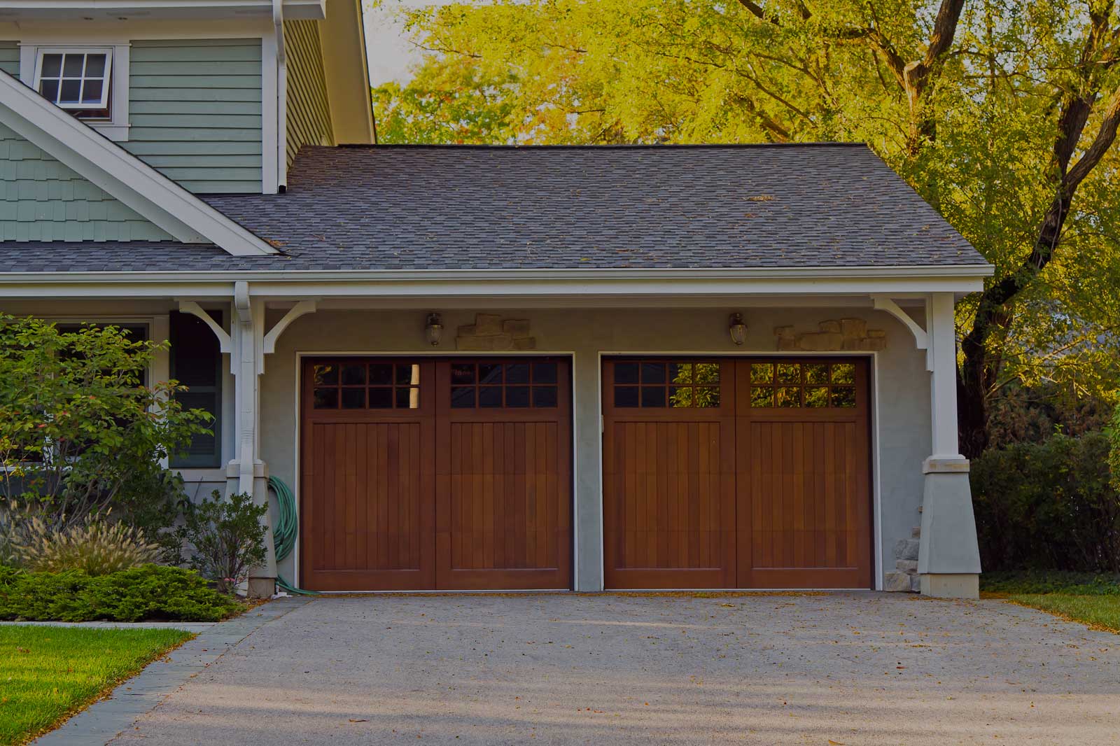 This is an image of a wood Spanish style garage door in Laguna Hills, CA.