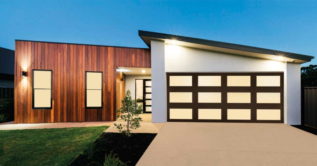 This is an image of a modern glass garage door on a contemporary California home.