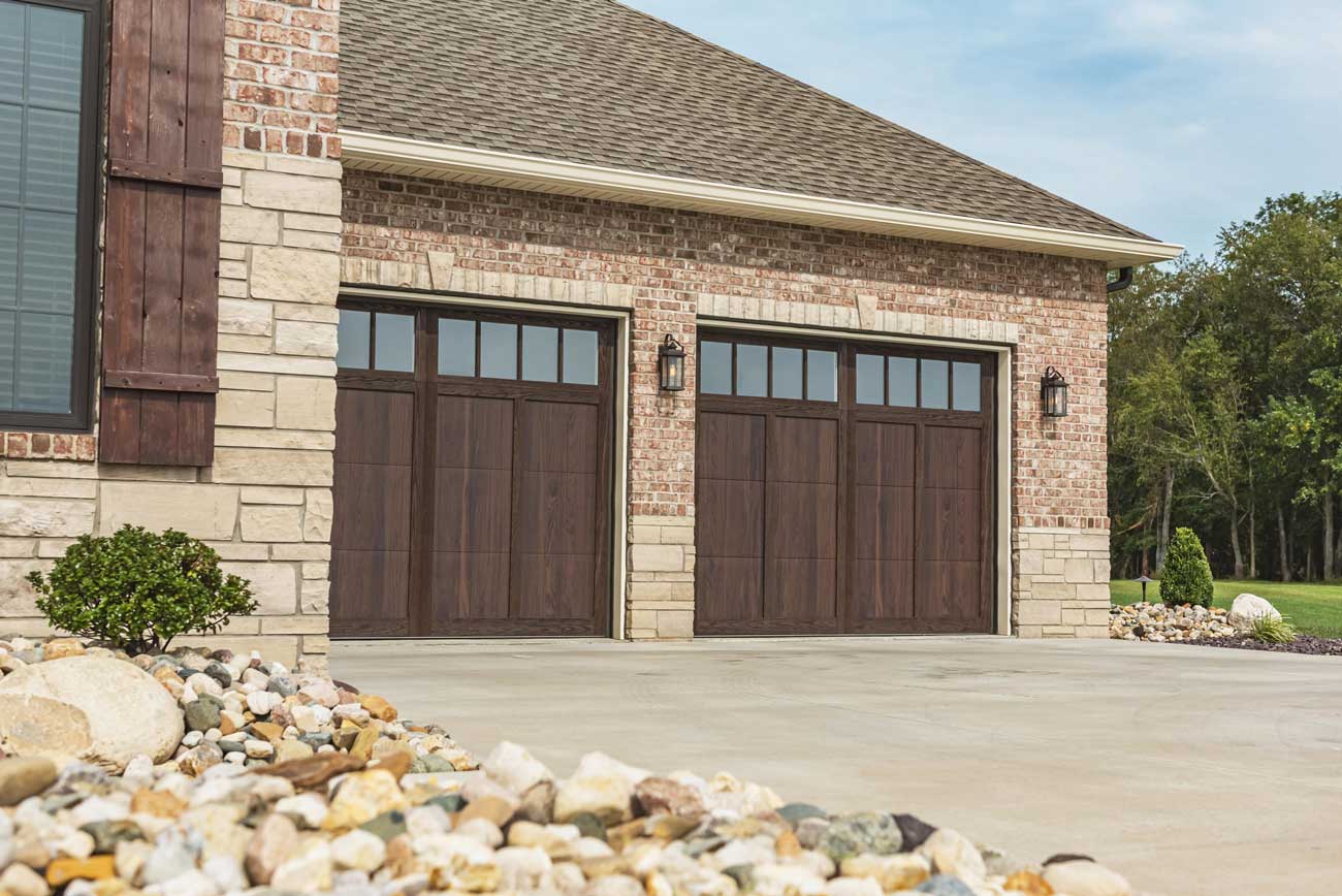 This is an image of a Shoreline carriage house style garage door with wood over steel overlay.