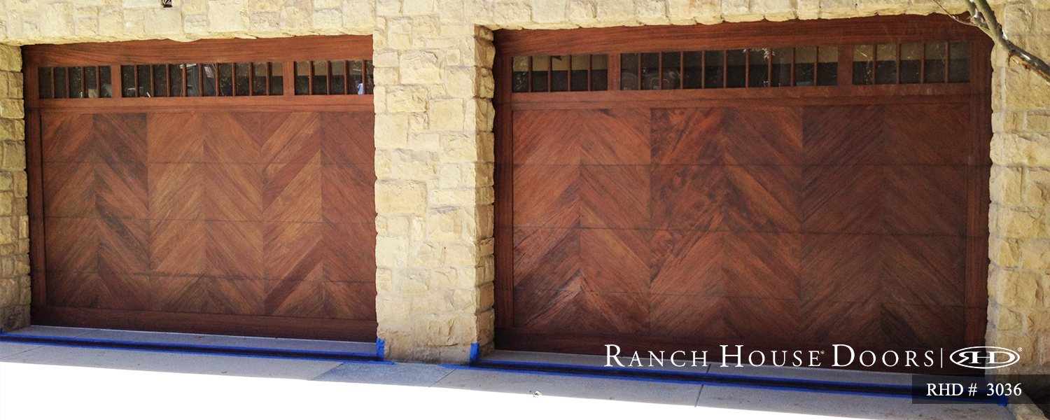 This is an image of a spanish style wood garage door with fishtail design in Orange County, CA.