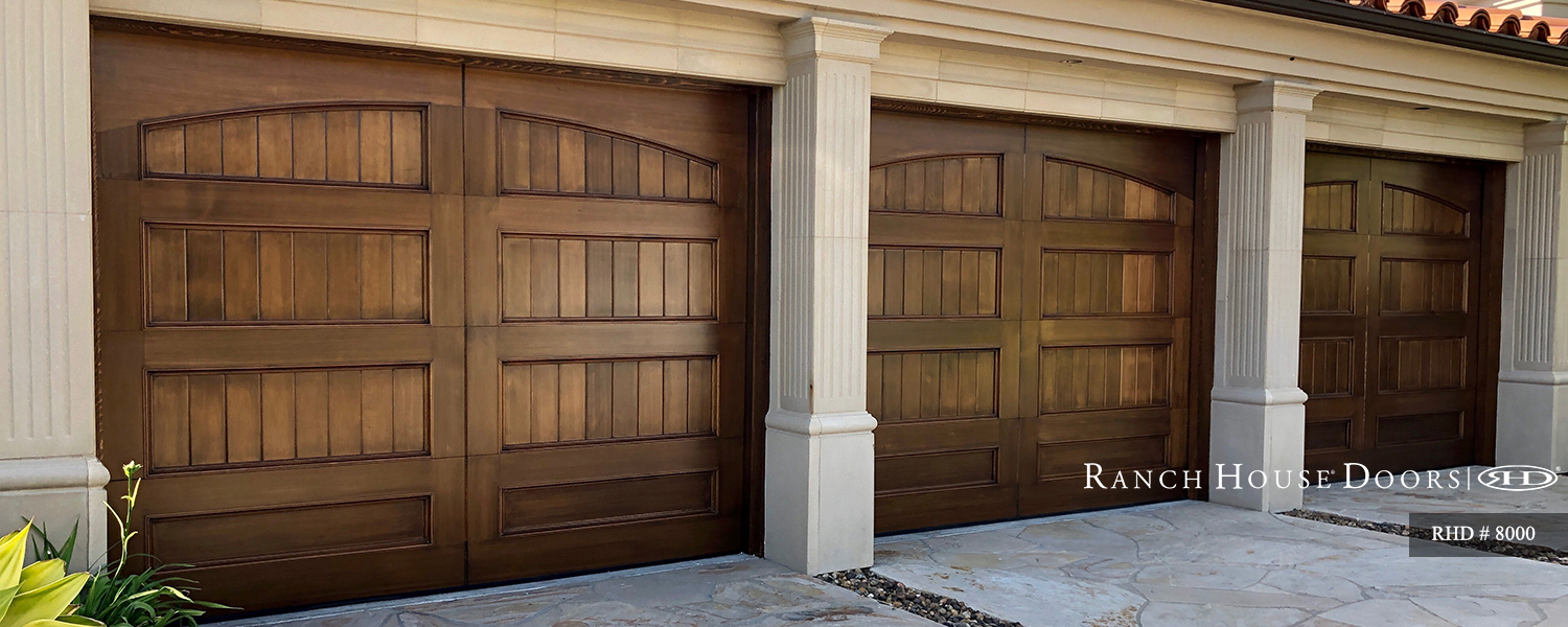 This is an image of a spanish style wood garage door in Capistrano Beach, CA.