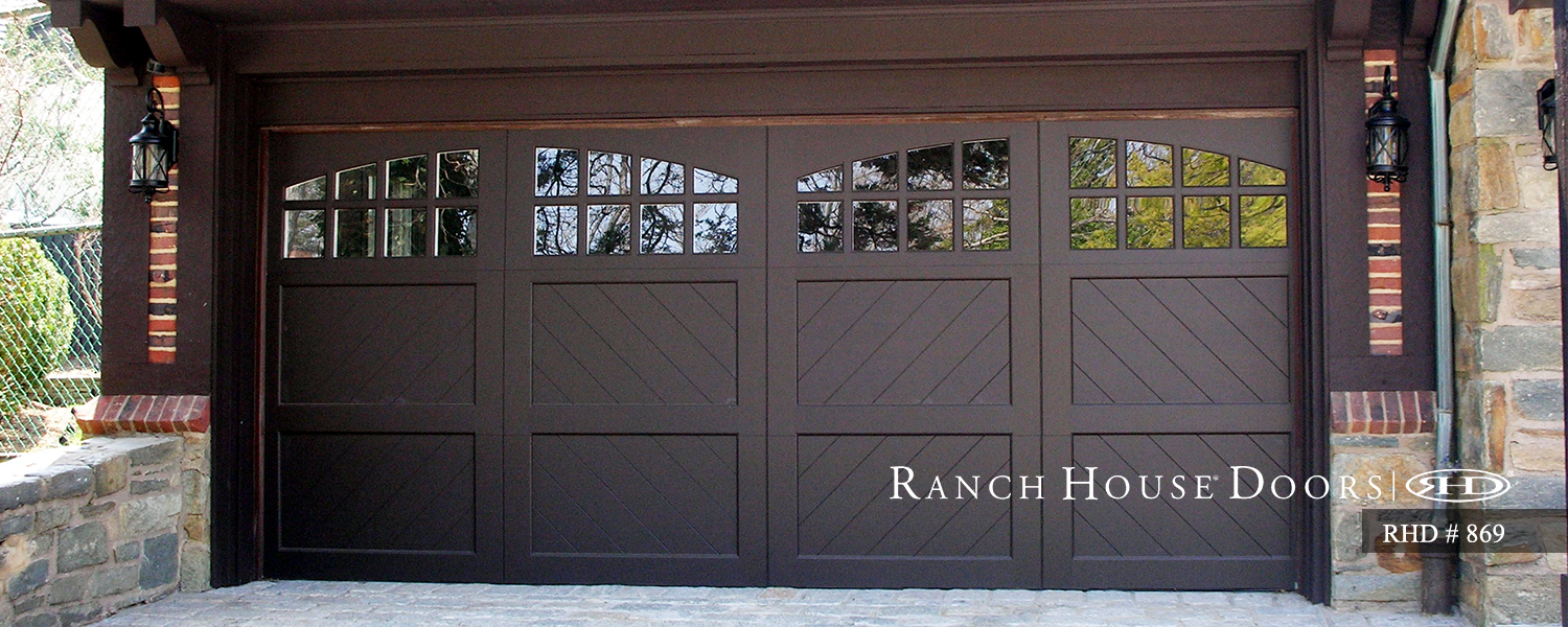 This is an image of a spanish style wood garage door with painted exterior in Foothill Ranch, CA.