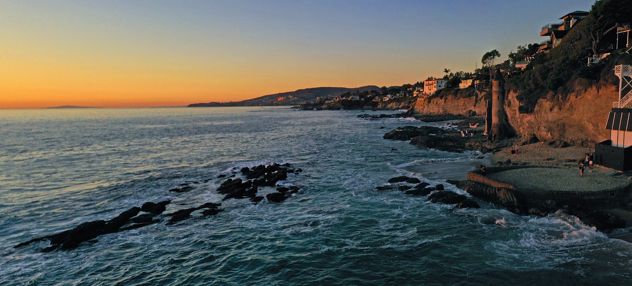 This is an image of the beach featuring a pirate's tower in Laguna Beach, CA.